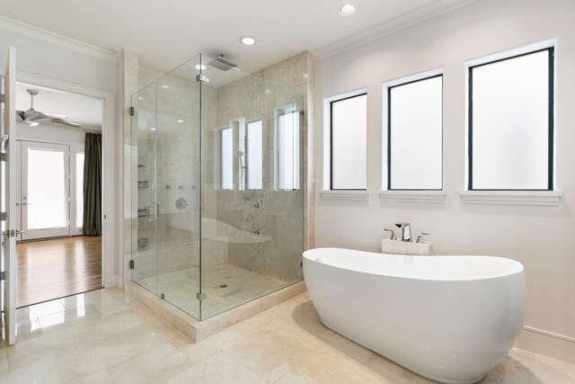 6011 Burgoyne Rd Unit A, Houston, TX 77057 - full bathroom with a stall shower, a soaking tub, recessed lighting, a ceiling fan, and ornamental molding