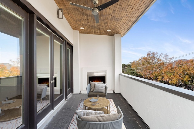 balcony featuring a ceiling fan