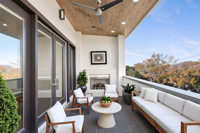6011 Burgoyne Rd Unit A, Houston, TX 77057 - balcony featuring an outdoor hangout area and a ceiling fan