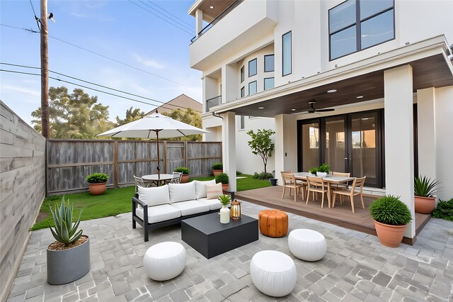 6011 Burgoyne Rd Unit A, Houston, TX 77057 - fenced backyard featuring outdoor dining space, a patio area, and outdoor lounge area
