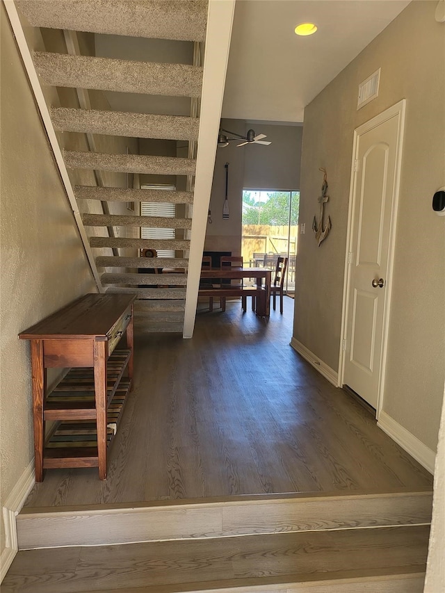 3922 Lakewood Dr, Montgomery, TX 77356 - staircase with visible vents, baseboards, ceiling fan, and wood finished floors