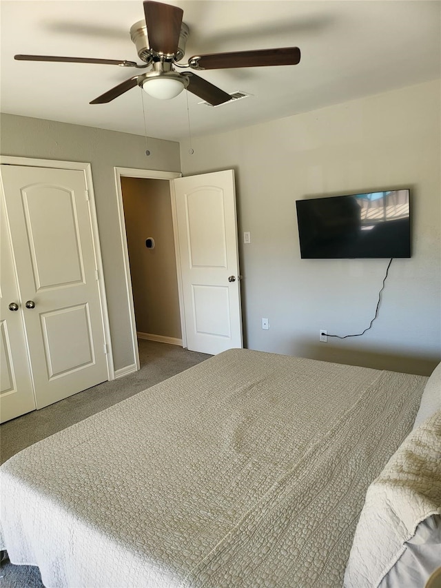 3922 Lakewood Dr, Montgomery, TX 77356 - carpeted bedroom featuring baseboards and ceiling fan