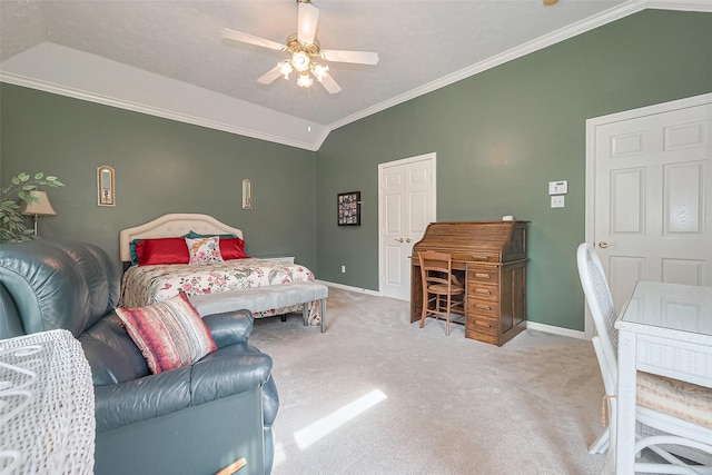 bedroom with baseboards, carpet flooring, lofted ceiling, and ornamental molding