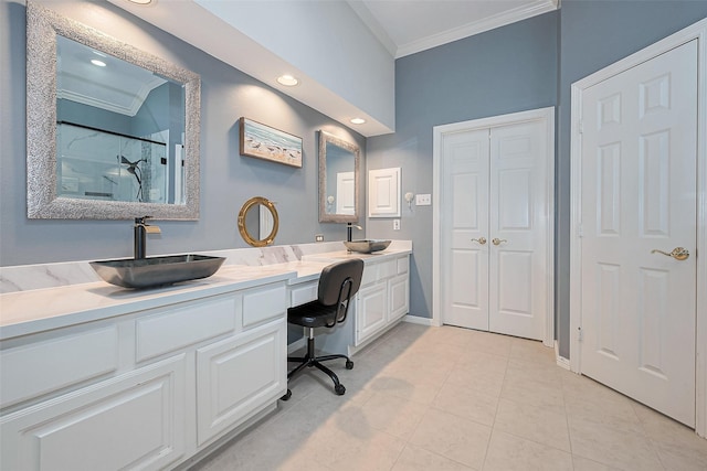 full bathroom with a sink, ornamental molding, a stall shower, and double vanity