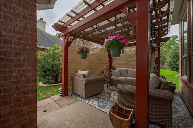 view of patio with a pergola and an outdoor living space