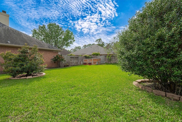 view of yard featuring fence
