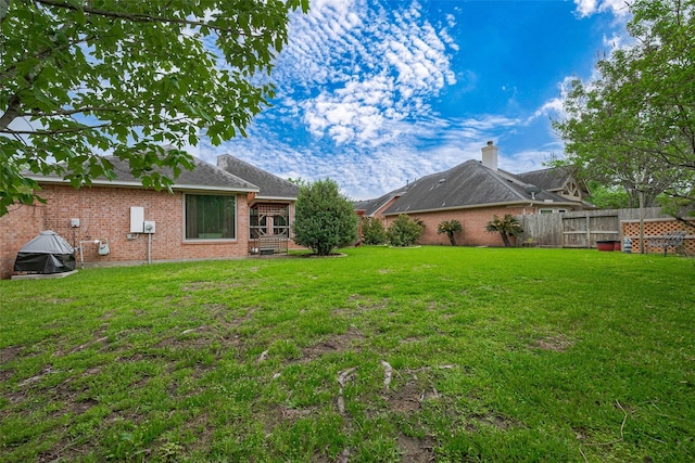 view of yard featuring fence