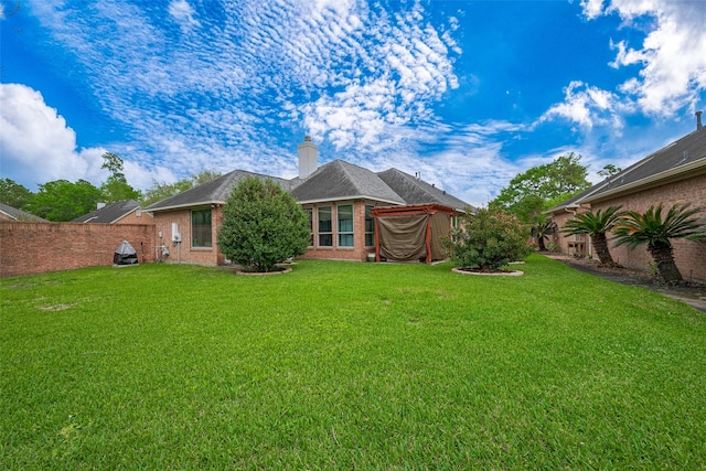 view of yard with fence