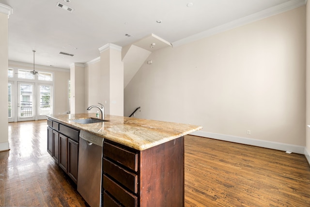 kitchen with ornamental molding, dark wood-style flooring, baseboards, a sink, and dishwasher