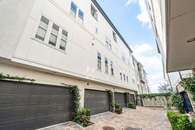 1027 Saint Charles St, Houston, TX 77003 - view of building exterior featuring a garage
