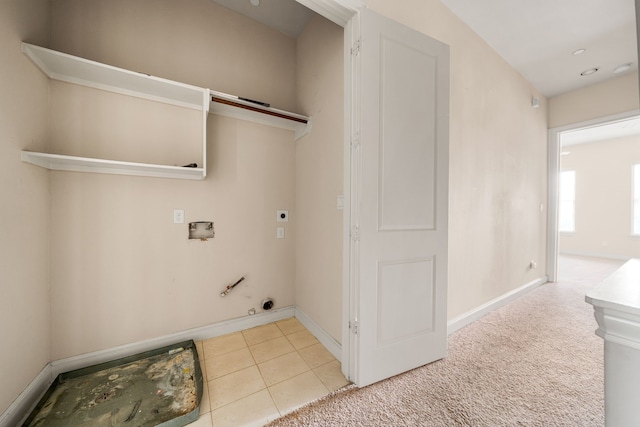 laundry room featuring laundry area, hookup for a washing machine, tile patterned floors, hookup for an electric dryer, and hookup for a gas dryer