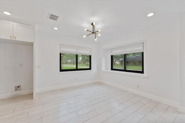 2611 Teague Rd, Houston, TX 77080 - unfurnished room with baseboards, recessed lighting, a chandelier, and visible vents
