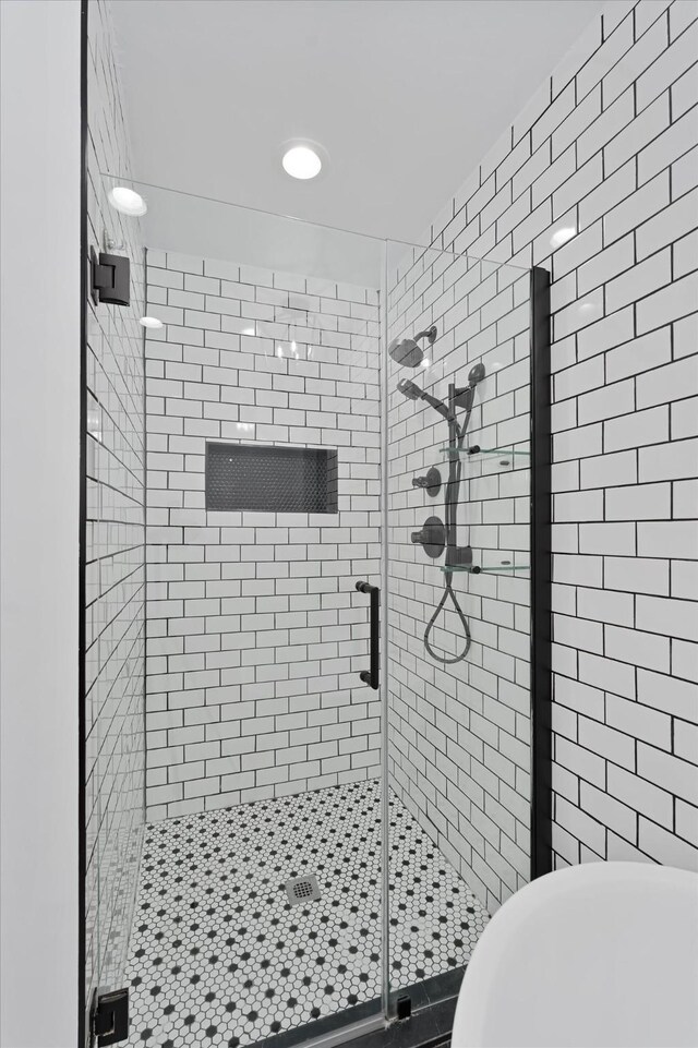 2611 Teague Rd, Houston, TX 77080 - bathroom with a soaking tub and a shower stall