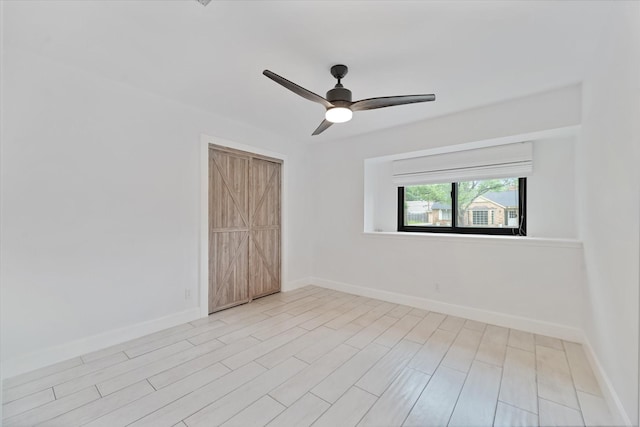 2611 Teague Rd, Houston, TX 77080 - spare room with light wood-type flooring, baseboards, and a ceiling fan