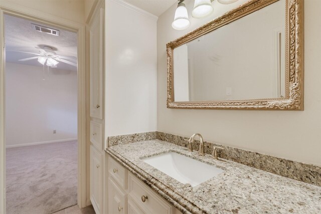 714 Last Arrow Dr, Houston, TX 77079 - bathroom featuring a ceiling fan, vanity, and crown molding