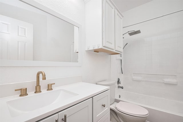 bathroom with vanity, shower / bathing tub combination, and toilet