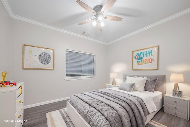 bedroom with visible vents, ornamental molding, dark wood-style flooring, baseboards, and ceiling fan