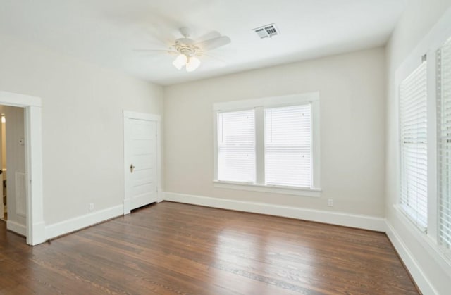 219 W 13th St, Houston, TX 77008 - spare room featuring visible vents, baseboards, ceiling fan, and wood finished floors