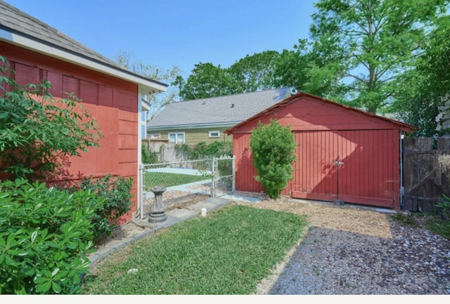 219 W 13th St, Houston, TX 77008 - view of shed featuring a gate and fence