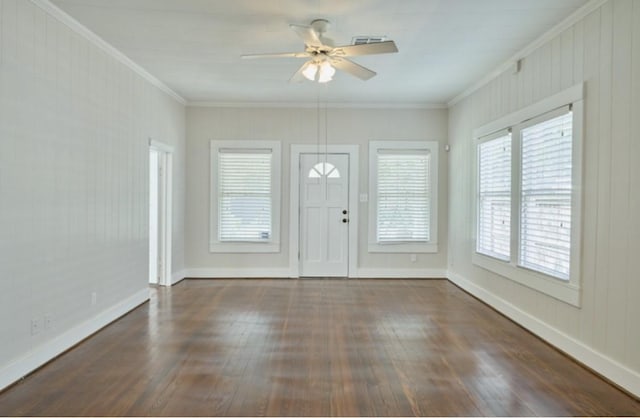 219 W 13th St, Houston, TX 77008 - foyer with crown molding, baseboards, a ceiling fan, and dark wood-type flooring
