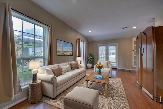 708 4th St, Sealy, TX 77474 - living room with healthy amount of natural light, wood finished floors, baseboards, and recessed lighting