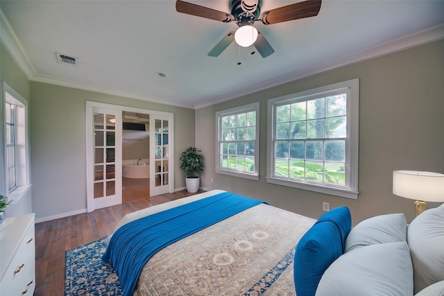 708 4th St, Sealy, TX 77474 - bedroom with french doors, ornamental molding, wood finished floors, baseboards, and ceiling fan
