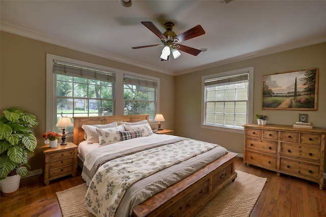 708 4th St, Sealy, TX 77474 - bedroom with ornamental molding, hardwood / wood-style flooring, and a ceiling fan