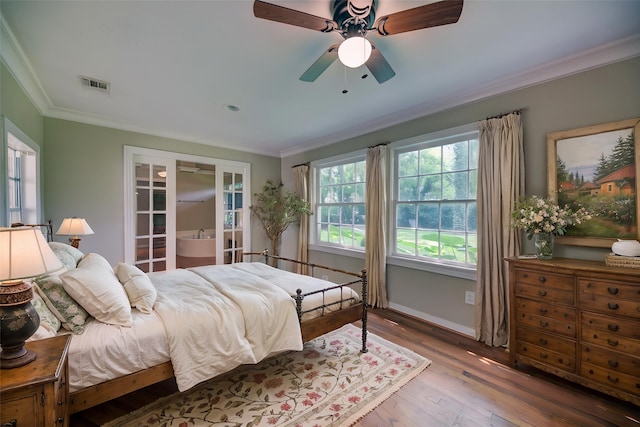 708 4th St, Sealy, TX 77474 - bedroom featuring hardwood / wood-style floors, ornamental molding, baseboards, and a ceiling fan