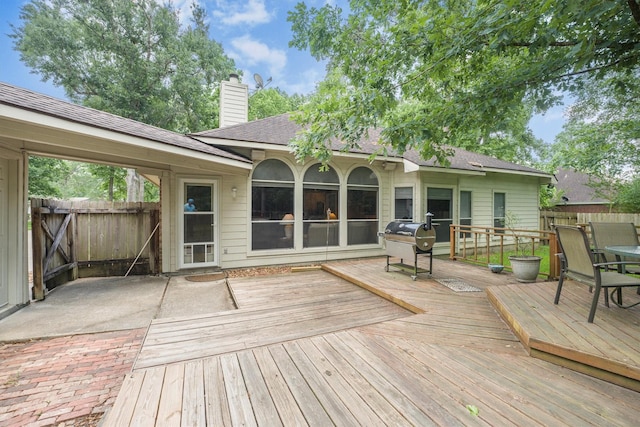 wooden terrace with fence