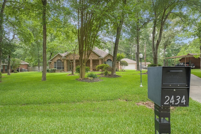 view of front of house featuring a front lawn