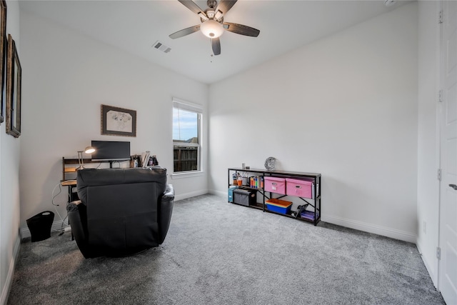 office featuring visible vents, carpet flooring, baseboards, and ceiling fan