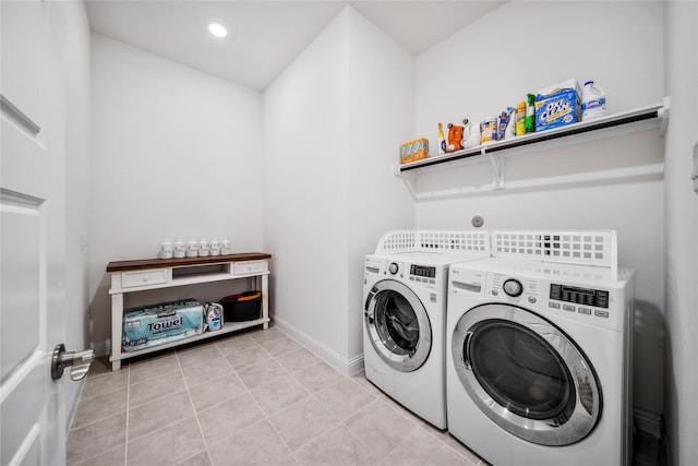 laundry area featuring laundry area, separate washer and dryer, recessed lighting, baseboards, and light tile patterned floors