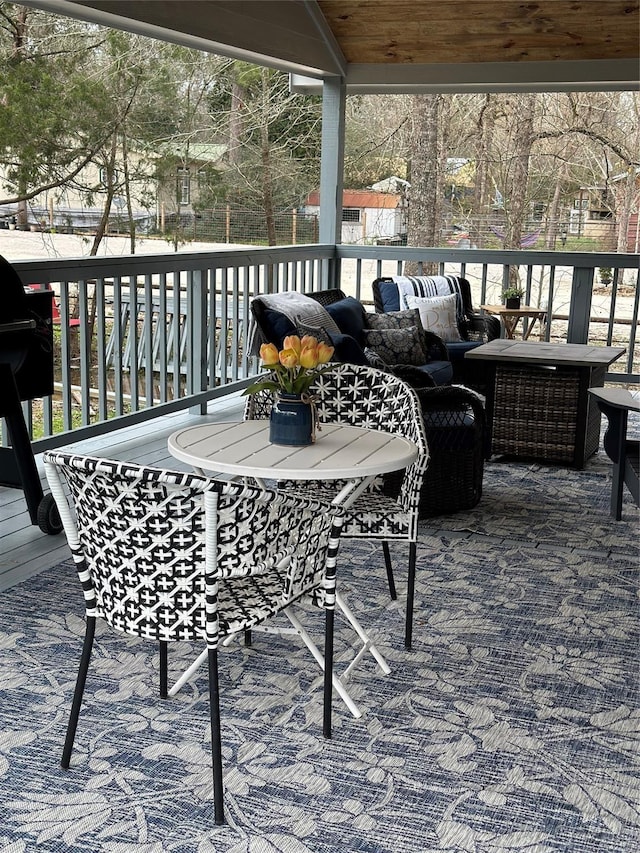 deck with an outdoor living space