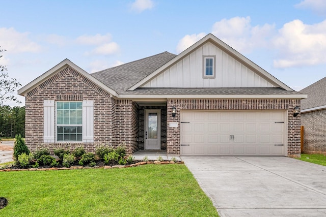 15686 Honey Cove Dr, Conroe, TX 77303 - view of front facade featuring brick siding, a shingled roof, board and batten siding, an attached garage, and driveway