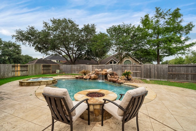 3615 Caleb Ln, Missouri City, TX 77459 - view of pool with an outdoor fire pit, a fenced backyard, a patio area, and a pool with connected hot tub