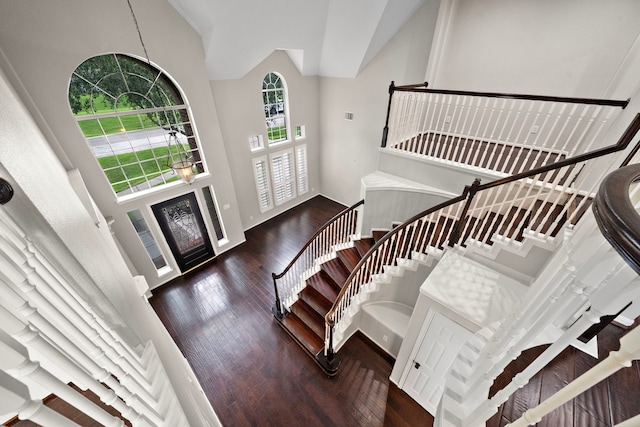 3615 Caleb Ln, Missouri City, TX 77459 - foyer entrance featuring wood finished floors, stairs, and a towering ceiling