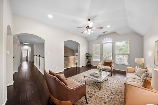 3615 Caleb Ln, Missouri City, TX 77459 - living room with ceiling fan, vaulted ceiling, wood finished floors, arched walkways, and baseboards