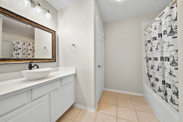 3615 Caleb Ln, Missouri City, TX 77459 - bathroom featuring baseboards, tile patterned floors, vanity, and shower / tub combo
