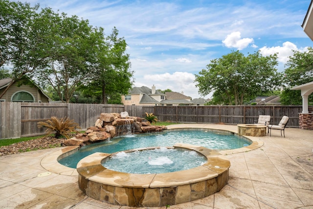 3615 Caleb Ln, Missouri City, TX 77459 - view of pool featuring a patio area, a fenced backyard, an outdoor fire pit, and a pool with connected hot tub