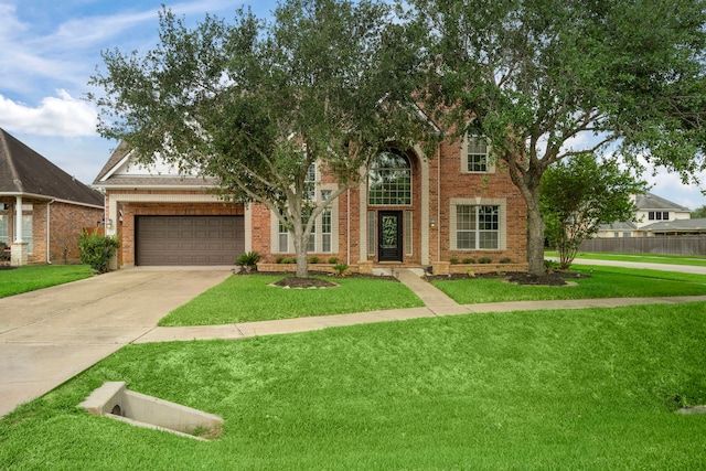 3615 Caleb Ln, Missouri City, TX 77459 - view of front of house featuring brick siding, concrete driveway, and an attached garage