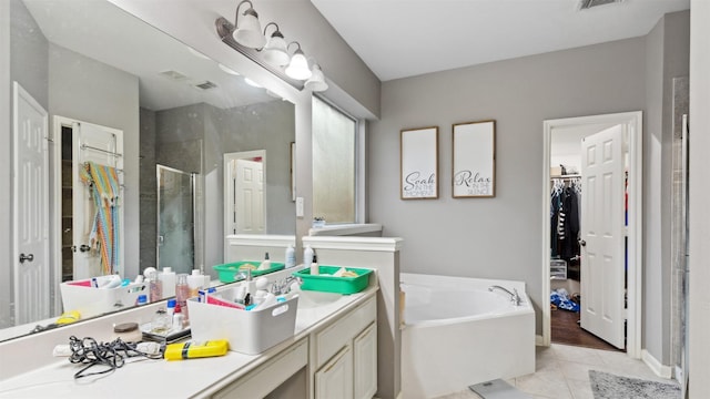 full bath featuring a garden tub, visible vents, vanity, tile patterned floors, and a stall shower