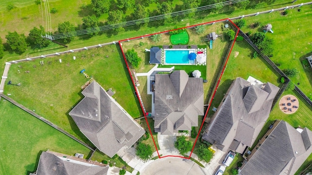 aerial view of property's location with a pool and property parcel outlined