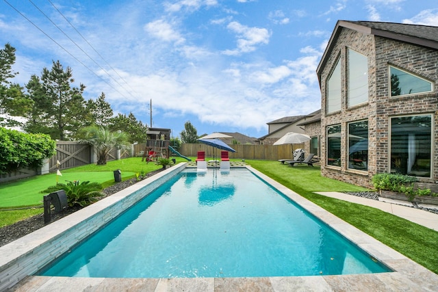 view of pool featuring a playground