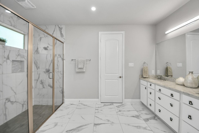 bathroom with recessed lighting, vanity, a marble finish shower, baseboards, and marble look tiles