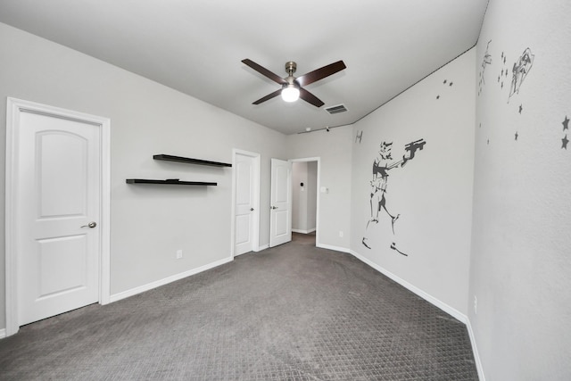 unfurnished bedroom with carpet, baseboards, and ceiling fan