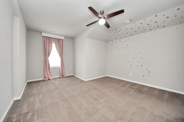 unfurnished room featuring carpet flooring, baseboards, and ceiling fan