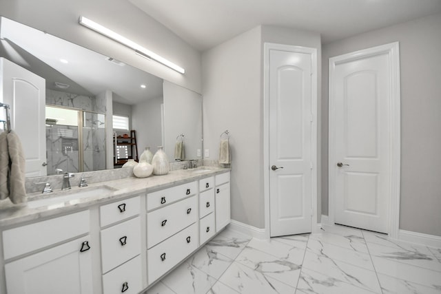 full bath featuring baseboards, a marble finish shower, double vanity, marble look tile flooring, and recessed lighting