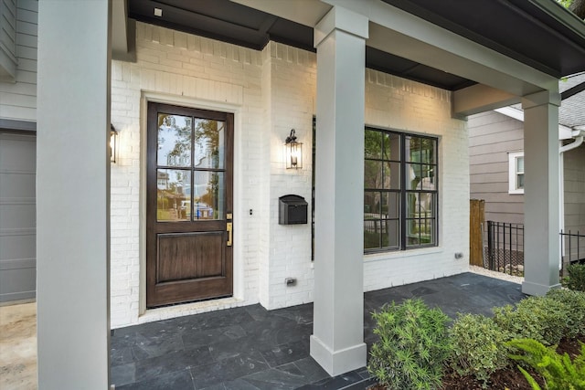 1016 Alexander St, Houston, TX 77008 - property entrance featuring a porch and brick siding