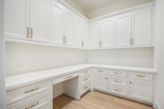1016 Alexander St, Houston, TX 77008 - unfurnished office featuring built in desk and light wood-style floors