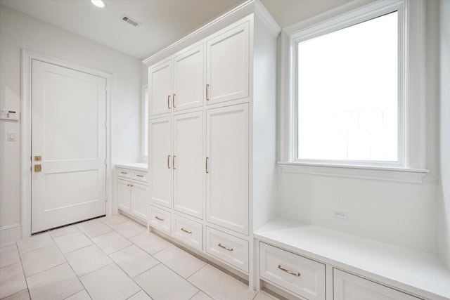 1016 Alexander St, Houston, TX 77008 - mudroom with light tile patterned floors
